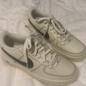 Nike Cream and Black Athletic Shoes